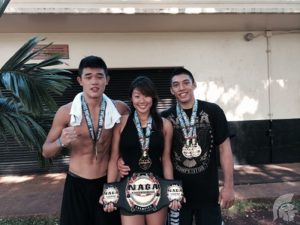 (L-R) Sophomore Christian Lee took first and third place, Senior Angela Lee won four first place titles and alumnus Bobby Kim, who also competed in the NAGA tournament won two first place titles.