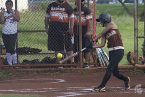 (Ireland Castillo | Trojan Times) Before challenging Campbell High School for the title of Division I champions, the JV girls softball team challenged the Moanalua Menehunes. 