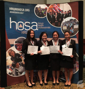 (Photo courtesy of Senior Nikki Chinen) (L-R): Marissa Chung (11), Nikki Chinen (12), Kayla Kashima (11) and Bethany Castro (11) pose with their bronze medals and certificates for their project. Prior to presenting their project at the convention, the group received support from Health teacher Candace Chun and alumna Fejiereich Luz Lopez, both of whom have been involved in the Health Occupations Students of America – Future Health Professionals program for several years as a former adviser and member respectively.
