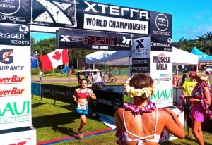 (Photo courtesy of Brandee Schiller (12)) With the official time of 5:15.08, Brandee Schiller crosses the finish line after her long and tiresome journey, thus marking the end of her life-changing cross country season and the XTerra World Championship triathlon.